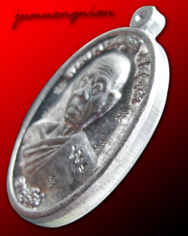เหรียญหลวงพ่อคูณ รุ่นอายุยืน ปี ๕๓ เนื้อตะกั่ว สำหรับแจกผู้ที่จองเหรียญทองคำ #002#