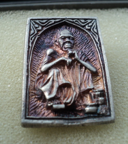 เหรียญหล่อหลวงพ่อคูณ ปริสุทโธ รุ่นพรปีใหม่ เนื้อเงิน ปี 2537