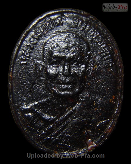 ปี 2534 เหรียญไข่รูปเหมือน ที่ระลึกอายุครบ75ปี หลวงพ่อยิด วัดหนองจอก (5.เนื้อครั่งพุทรา)
