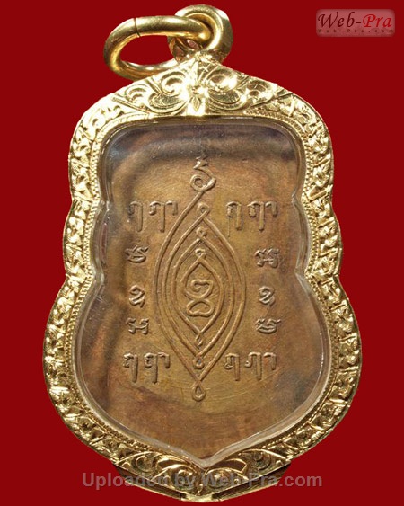 ปี 2496 เหรียญพิมพ์เสมาครึ่งองค์หลังยันต์ ฤ ฤๅ หลวงปู่เผือก ปญญาธโร (เนื้อทองแดง)