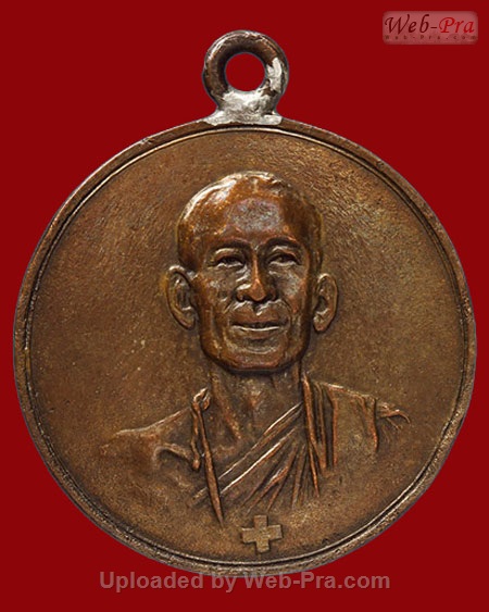 ปี 2495 เหรียญรุ่นแรก หลวงพ่อโอภาสี วัดพุทธบูชา อาศรมบางมด จ.กรุงเทพฯ (เนื้อทองแดง )