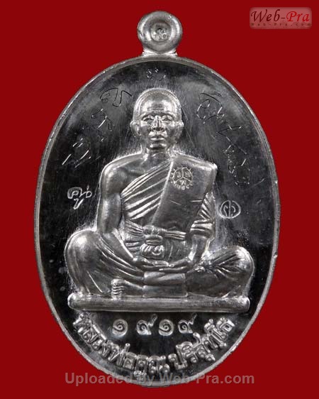 ปี 2554 เหรียญย้อนยุครุ่นสร้างบารมี ปี 2519 รุ่น พุทธคุณสยามมหาลาภ หลวงพ่อคูณ ปริสุทโธ วัดบ้านไร่ (2.เนื้อเงิน)