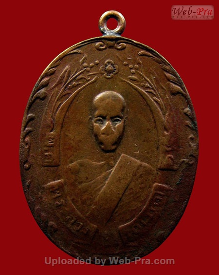 ปี 2465 เหรียญรุ่นแรก พิมพ์โมมีใส้ หลวงพ่อฉุย สุขภิกขุ วัดคงคาราม ต.มะม่วง อ.คลองกระแชง จ.เพชรบุรี (เนื้อทองแดง)