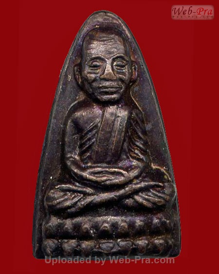 ปี 2524 เตารีดหลังหนังสือ พิมพ์นะใหญ่ หลวงพ่อทวด วัดช้างให้ (บล็อคจีวร 3 เส้น)