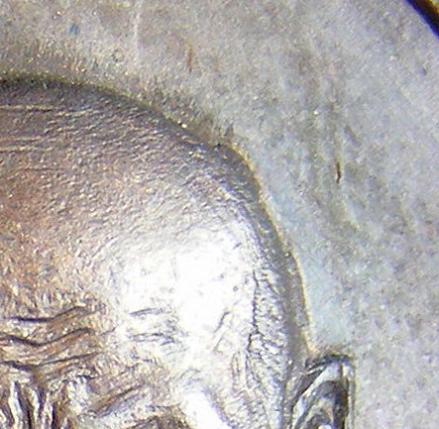 เหรียญหลวงปู่ทองมา ถาวโร วัดสว่างท่าสี จ.ร้อยเอ็ด ปี 2518 เนื้อทองแดง เลี่ยมเงิน