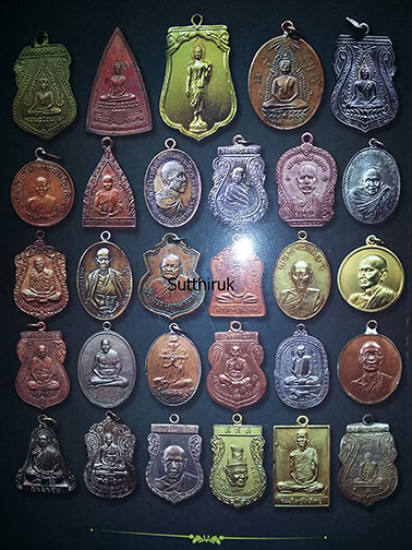 หนังสือ ชี้ตำหนิ เหรียญยอดนิยม โดย อ.ยอดชาย ท่าพระจันทร์