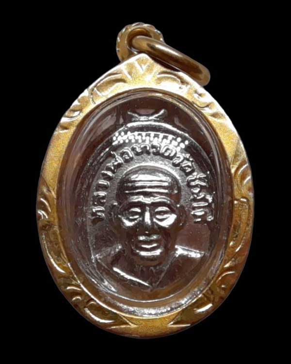 ปี 2508 เหรียญเม็ดแตง หลวงพ่อทวด วัดช้างให้ จ.ปัตตานี พิมพ์หน้าแว่นหลัง ณ แตก