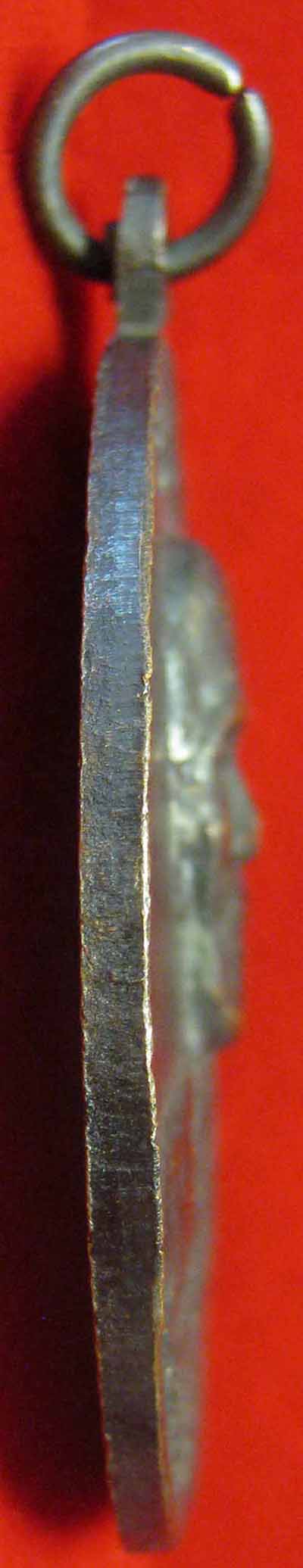 เหรียญรุ่นแรกหลวงปู่คำคะนิง ผู้มีพุทธานุภาพเทียบเท่าหลวงพ่อปาน+บัตรรับรองพระแท้*115