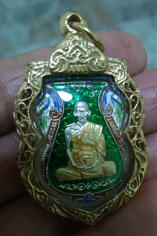 เหรียญหลวงพ่อรวย วัดตะโก รุ่นไตรมาส59 รวย รวย รวย เนื้อเงินลงยา ปี2559(โค๊ต6642)บัตรสภาพสวย