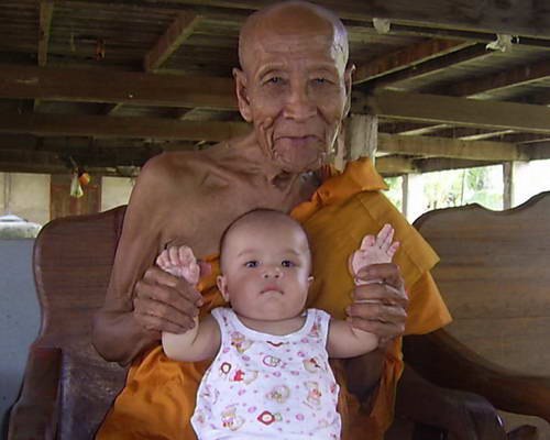 พระกริ่งสายรกพระพุทธเจ้า (รุ่นแรก)หลวงปู่คำบุ หมายเลข ๑๒๑๓