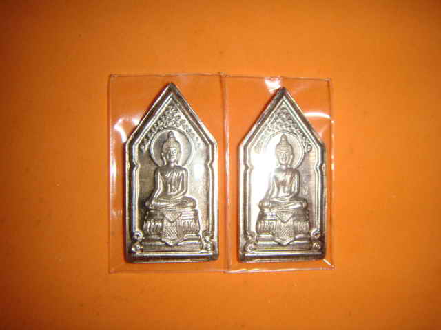 **เหรียญพระพุทธ ลป.คำพันธ์  โฆสปัญโญ เนื้อเงิน**