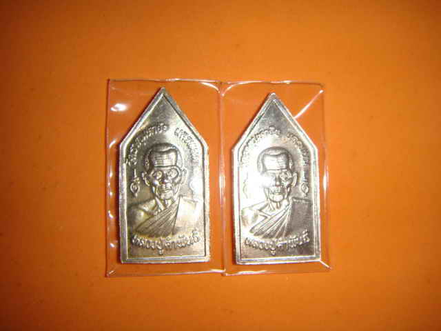 **เหรียญพระพุทธ ลป.คำพันธ์  โฆสปัญโญ เนื้อเงิน**