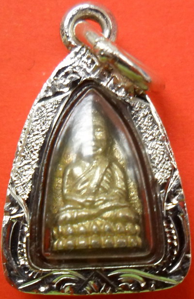 หลวงปู่ทวด เตารีดจิ๋ว วัดช้างให้ รุ่นกำนันชูชาติ (เลี่ยมเงิน)