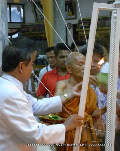 เหรียญปาดตาล หลวงพ่อคูณ หมายเลข  ๓๐๔ ( รุ่นพุทธคูณสยาม ) แจกทานเนื้อตะกั่วไม่ตัดปีก 