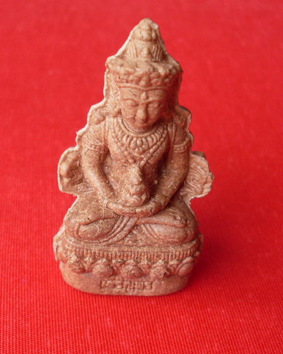 พระกริ่งเจริญพร หลวงปู่คำบุ วัดกุดชมภู (เนื้อผงยาจินดามณี)