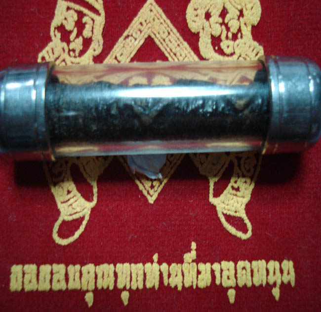 ตะกรุดเก่า ลงรักถักเชือก   ความยาว  2 นิ้ว