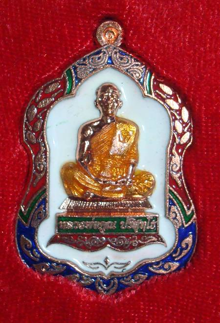 เหรียญ โล่ห์ใหญ่ พุทธคูณสยาม เนื้อทองแดง ลงยา หมายเลข ๔๑๐  ครับ