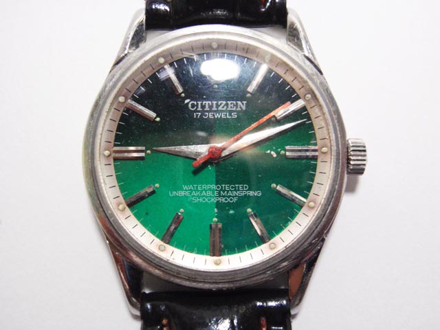 Citizen ไขลานเรือนบาง ตัวเรือน Stainless ขาบิด หน้าปัดไล่โทนสีเขียว-ดำ สวย ขนาด 34 มม 