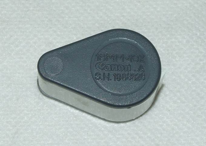 กล้องส่อง Canon.AS.H. 1989628 ขนาด 10X 18mm ขอบขาว เลนส์ 3 ชั้น คุณภาพดี เคาะเดียวครับ