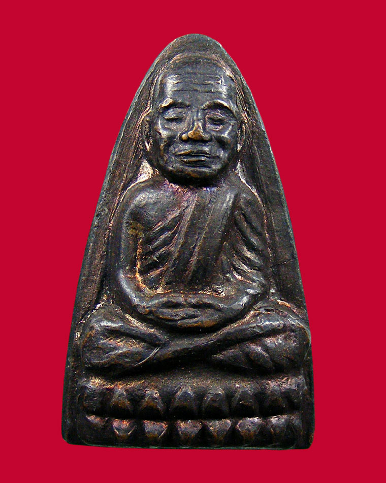 หลวงปู่ทวดหลังหนังสือ พิมพ์หน้าใหญ่นิยม ปี 2524 วัดช้างให้ องค์ที่1