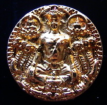 เหรียญ อริยทรัพย์ พระธาตุทองคำ เนื้อทองทิพย์ 4 องค์