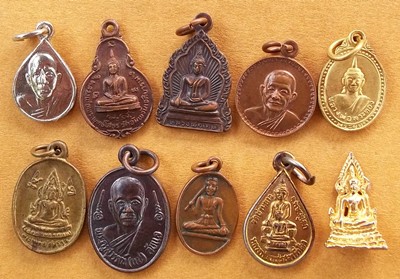 รวมพระเหรียญเล็ก 50 เหรียญ  .......B144