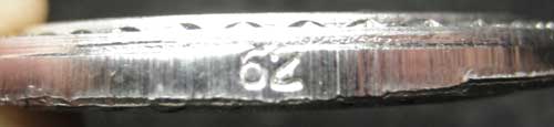 เหรียญชนะจน แจกทาน เนื้อดีบุกสองหน้า อ.แดง วัดไร่ หมายเลข 62