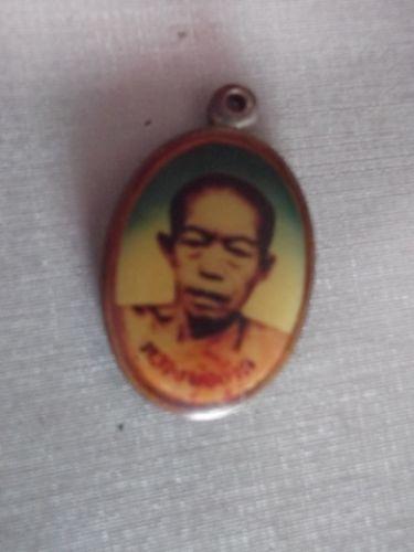 ล็อกเก็ตรุ่นแรก หลวงพ่ออ้วน วัดโนนค้อ ศรีษะเกษ หายาก (เคาะเดียว)