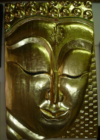 หน้าพระพุทธรูป ไม้แกะแผ่นเดียว ปิดแผ่นทองคำเปลว