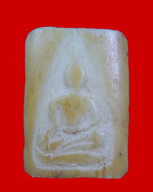 งาแท้ครับแกะรูปพระพุทธด้านหลังมียันต์ ไม่ทราบที่เคาะเดียว