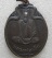 เหรียญงูเล็ก รุ่น 32 (รุ่นสุดท้าย) ปี 2521 หลวงพ่อเอีย วัดบ้านด่าน ปราจีนบุรี (เนื้อนวะโลหะ) ตอกโค๊ด