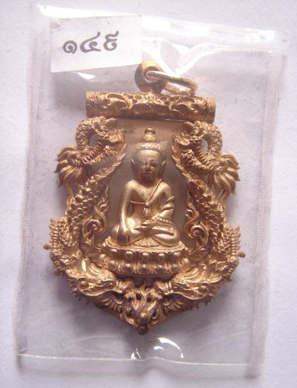 เหรียญเสมาฉลุ รุ่นพุทธปวเรศ เนื้อบอร์นแก่ทองคำ สวยงามครับ องค์นี้ 149