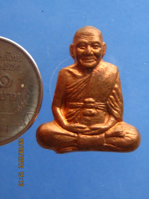 รูปเหมือนปั๊ม หลวงพ่อเปิ่น วัดบางพระ รุ่นแจกทาน เนื้อทองแดง หมายเลข 18167 ตอกโค้ด นะ