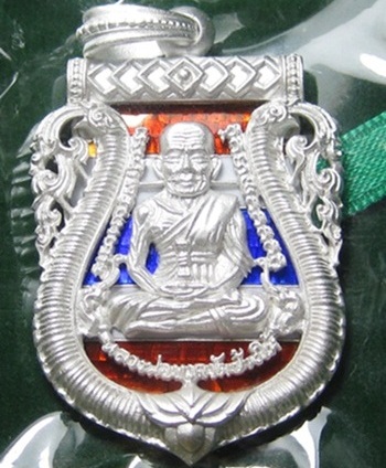เหรียญเสมาฉลุลาย หลวงปู่ทวด รุ่น 100 ปี อาจารย์ทิม  ( เนื้อเงินลงยาราชาวดี สีธงชาติ )ครับ 
