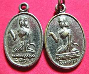 เหรียญนางกวัก หลังพระพุทธ ไม่ทราบที่ (เคาะเดียว)