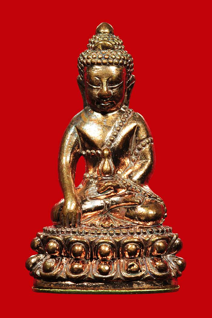 พระกริ่งใหญ่ หลวงปู่เกลี้ยง วัดโนนแกด จ.ศรีสะเกษ รุ่น เจริญพร-ยอดฉัตร เนื้อทองแดง ก้นถ้วยชนวน