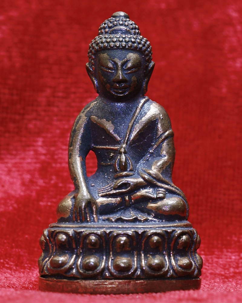 พระกริ่งศรีธาตุ"ไตรมาส" หลวงปู่เกลี้ยง วัดโนนเเกด จ. ศรีสระเกษ ปี 2553 เนื้อนวะก้นทองแดง หมายเลข๔๐๔