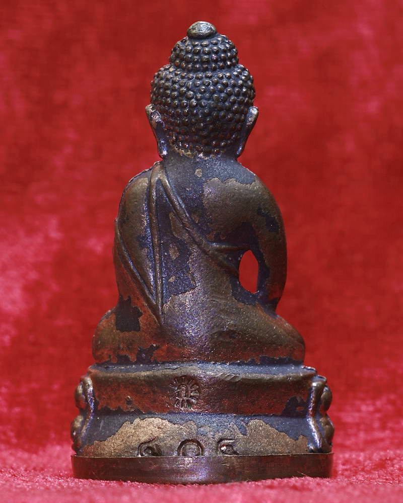 พระกริ่งศรีธาตุ"ไตรมาส" หลวงปู่เกลี้ยง วัดโนนเเกด จ. ศรีสระเกษ ปี 2553 เนื้อนวะก้นทองแดง หมายเลข๔๐๔