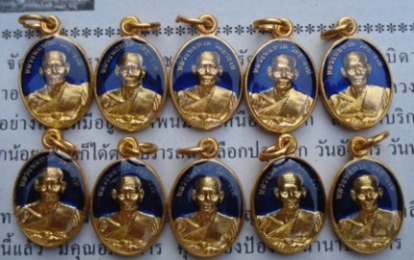 หลวงพ่อทวด วัดช้างให้ เม็ดแตงใหญ่ลงยาน้ำเงินเคลือบเรซิ่น  พร้อมใบคาถาจากวัด 10 องค์ E