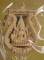 เหรียญเสมาฉลุลาย พระพุทธชินราช หลวงปู่แขก รุ่นมงคลชีวิต เนื้อทองระฆังตะกรุดเงิน เลข 473