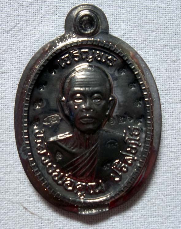 NO.๑๒๖ เหรียญหลวงพ่อคูณ ปริสุทโธ รุ่น เจริญพร ๘๙ เนื้อตะกั่วไม่ตัดปีกหลังยันต์ ออกวัดถนนหักใหญ่  