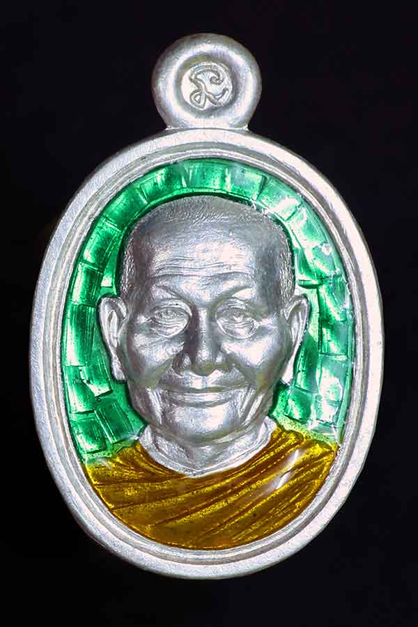 เหรียญเม็ดแตงหลวงพ่อจรัญ รุ่นโภคทรัพย์ เนื้อเงินลงยาราชาวดี สีเขียว