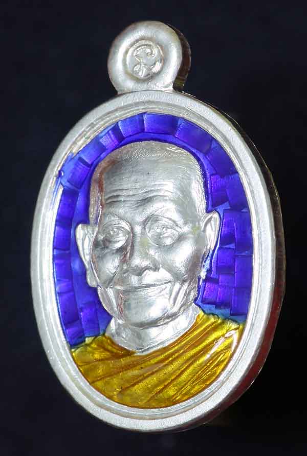 เหรียญเม็ดแตงหลวงพ่อจรัญ รุ่นโภคทรัพย์ เนื้อเงินลงยาราชาวดี สีน้ำเงิน