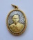 เหรียญหลวงพ่อคูณ รุ่น สก. เนื้อเงิน หน้าทองคำ เลี่ยมทอง