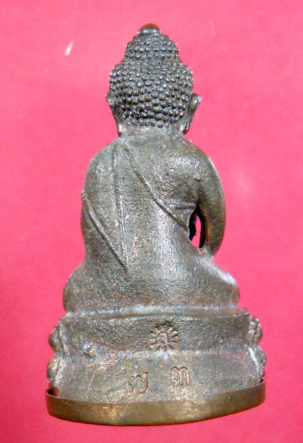 พระกริ่งศรีธาตุ หลวงปู่เกลี้ยง เตชธมฺโม วัดโนนแกด รุ่นไตรมาส ๕๓ พระกริ่งศรีธาตุ ไตรมาส หมายเลข 73