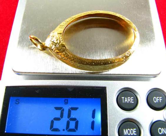 กรอบทองยกซุ้มหัวสิงห์ รูปไข่ หนัก 2.61 กรัม