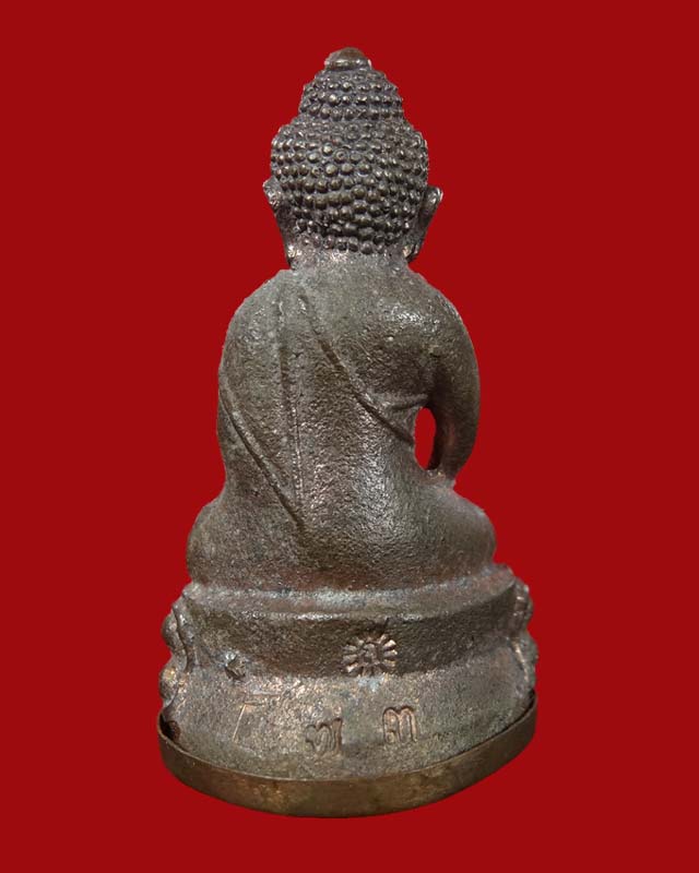 พระกริ่งศรีธาตุ หลวงปู่เกลี้ยง วัดโนนแกด(ศรีธาตุ) นวะก้นทองแดง No.73