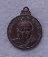 เหรียญกลมเล็ก นิรันตราย พระอาจารย์วัน อุตตโม วัดถ้ำอภัยดำรงธรรม สกลนคร ปี๒๕๑๘ 