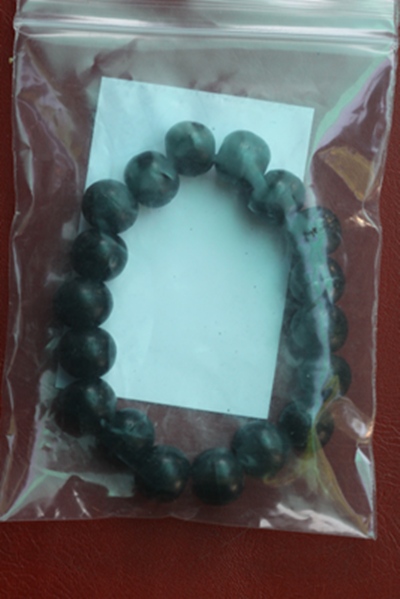 ลูกปะคำข้อมือ ทำจากไม้ยอ หลวงปู่เกลี้ยง วัดโนนแกด จ.ศรีสะเกษ