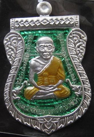 หลวงปู่ทวดหน้าเลื่อนรุ่นแรก100ปี เนื้อเงินลงยาสีเขียวเบอร๋100 สร้างแค่199องค์